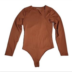 Abercrombie and Fitch asymmetrical women’s body suit